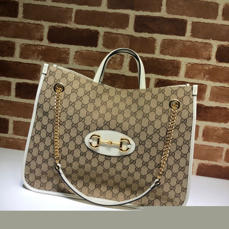 G*u*i shopping bags